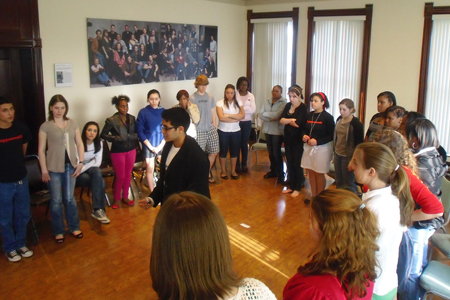 Young Adult Council member Owais Ahmed leads an activity