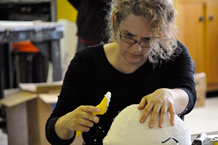 Adria Smith making a flower mold