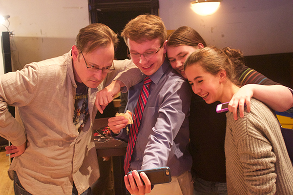 <i>1984</i> cast member Lance Baker poses for a selfie with guests