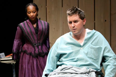 Lily Mojekwu as Mrs. Kendal and Michael Patrick Thornton as Merrick