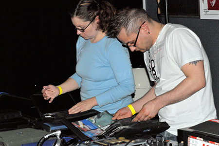 DJ Lucy Wak spins for the crowd. 