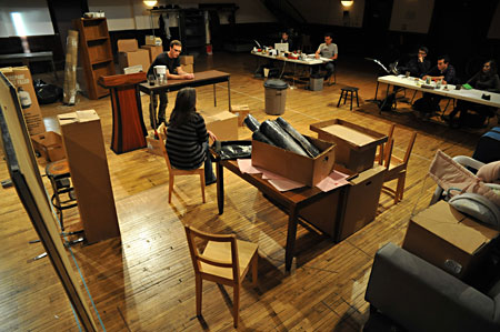 The cast and production team discuss the scene