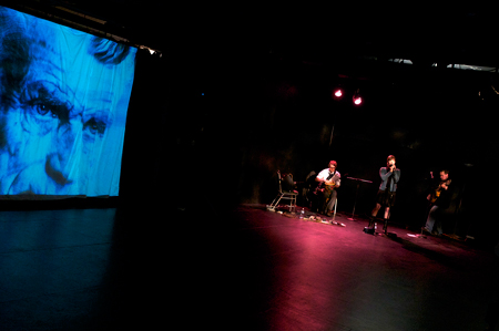 Projections by Mike Tutaj added ambiance and depth to the event.