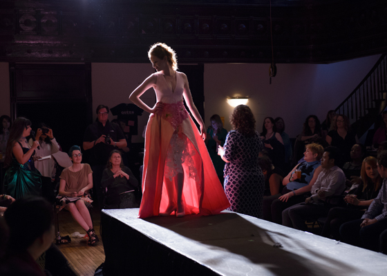 Designer Kat Anderson answers questions from the judges about her design