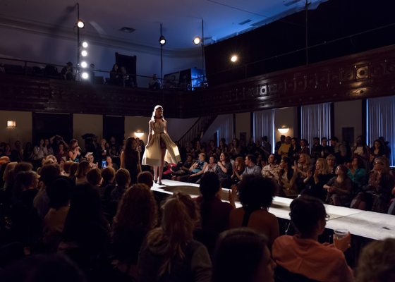 Designer Satoko Mizuno escorts her dress down the runway