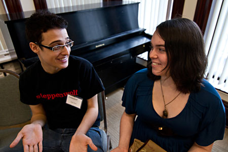 Evan Silver discusses the play with a friend