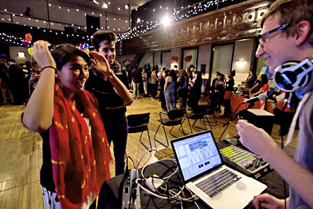 Young Adult Council seniors Cindy Avilla and Arturo Sepulveda put in some music requests to get the party started