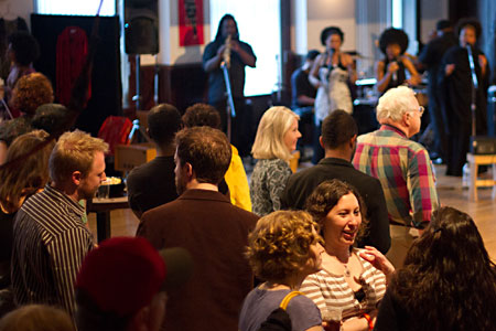 Guests enjoy the sweet sounds of Aniba Hotep & The Sol Collective, as well as 70s era appetizers and punch