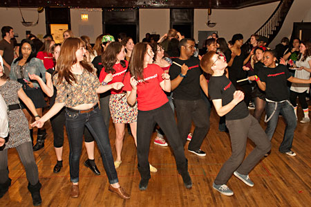 Young Adult Council members and their friends dance to 70s soul band Aniba Hotep and the Sol Collective