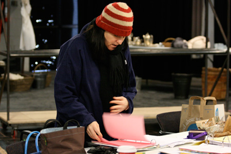 Director Hallie Gordon looks over script re-writes
