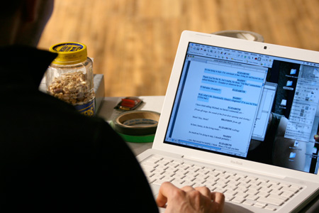 Asst. Stage Manager Jonathan Templeton notates script changes