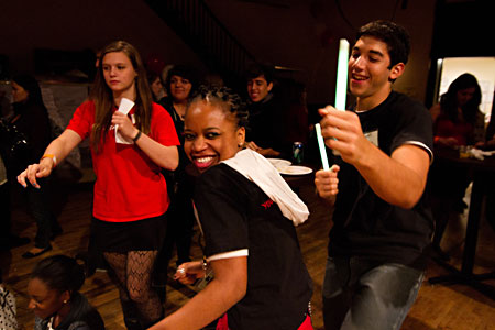 Young Adult Council members Carsen Joenk, Noelle Daniels, and Julian Cooper partake in a little dancing