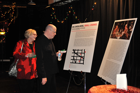 Guests read an investigative article placing American Buffalo in the Lincoln Park neighborhood.