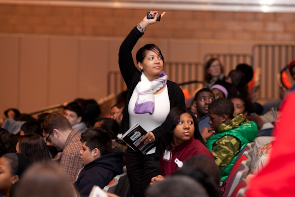 A group leader gathers her group of 30 students at the Gary Comer Youth Center