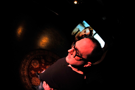 Bernd, (Paige Smith), disconnects with his domestic life at home with Renee, (Patrick Andrews). 
