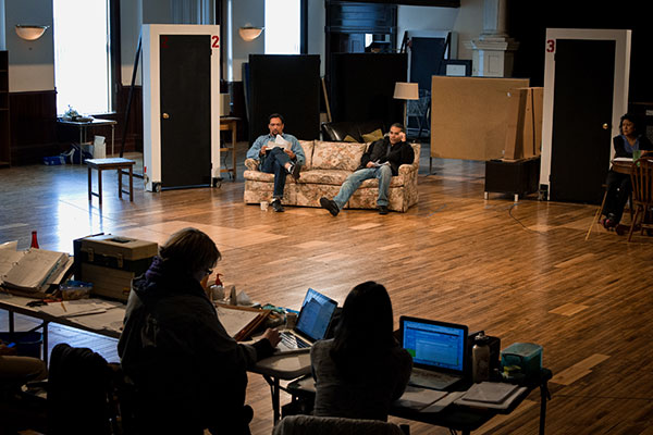 Cast and crew in the rehearsal room