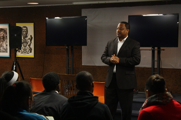 Roderick T. Sawyer, Alderman 6th Ward, welcomes students, teachers, and community members to the Whitney Young Library Branch performance of <i>How Long Will I Cry?</i>