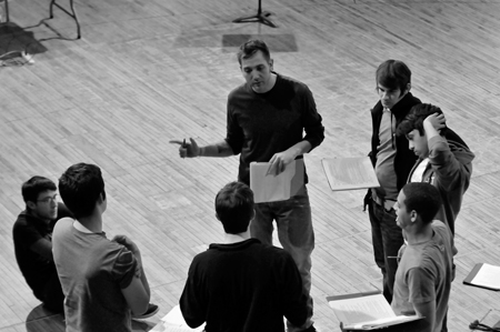 Director Jonathan Berry(center) talks with the cast