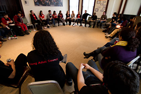 High schools students gather after a performance of Samuel J. and K. to meet the actors and talk about the play
