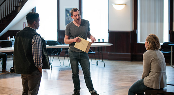 Ensemble member Jon Michael Hill, director Jonathan Berry and Jessie Fisher