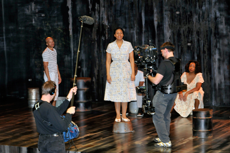 Glenn Davis, ensemble member Ora Jones with Jacqueline Williams and HMS Media crew