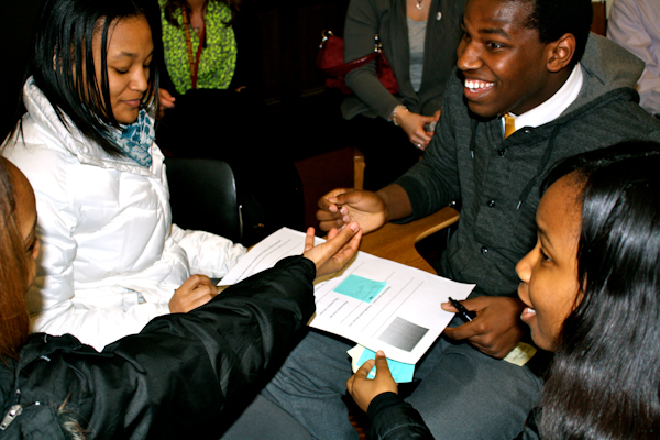 Following the performance at the Austin Library Branch, students from Christ the King Jesuit College Prep High School participate in a workshop utilizing poetry to express solutions to the problem of youth violence