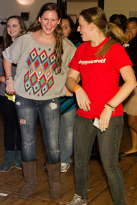 Young Adult Council member Lilly Newell dances with a friend