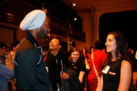 Tarell speaks to Young Adult Council member Safiya Nygaard during the party.