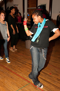 Young Adult Council member Noelle Daniels struts her stuff on the dance floor
