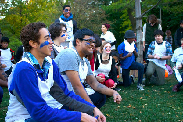 Members of Team Ralph intently listen to the rules of the game.