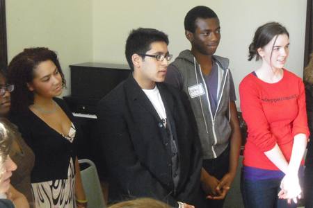 Young Adult Council members Owais Ahmed, Clifton Lyons and Claire Orzel listen to the conversation on The Tempest